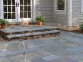 Patio and landing made of bluestone.