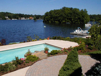 Swimming pool with concrete decking.