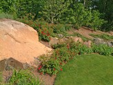 using boulders for walls and landscaping