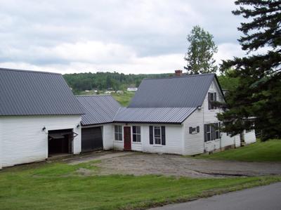 The driveway is gravel.