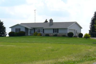 You can see where the yard divides. The bushes are all gone in front of the house.