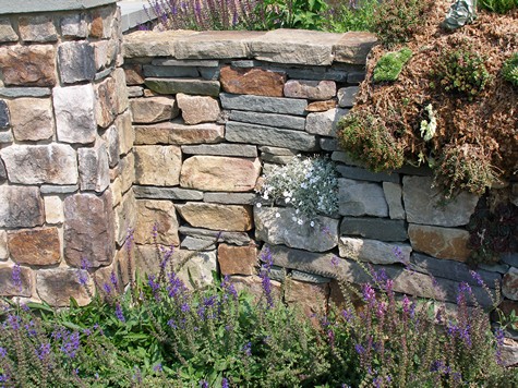 Rustic stone retaining wall.