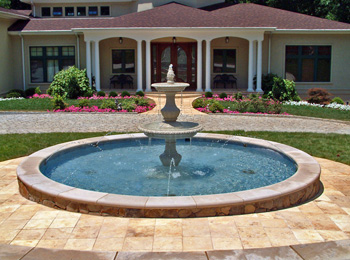 Travertine pavers color should blend with the house.