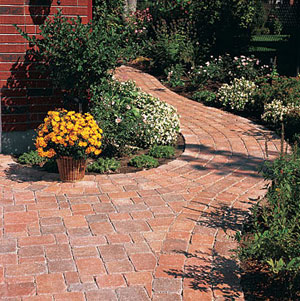 Brick colored pavers.