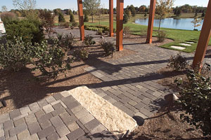 This is a walkway of mixed gray pavers.