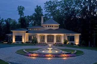 Driveway design with night lighting.