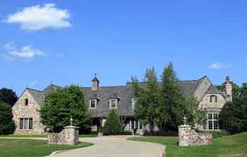 Columns at driveway entry.