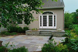 Bluestone patio with natural stone landing.