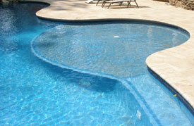 tanning shelf lets you sit in the water with chairs